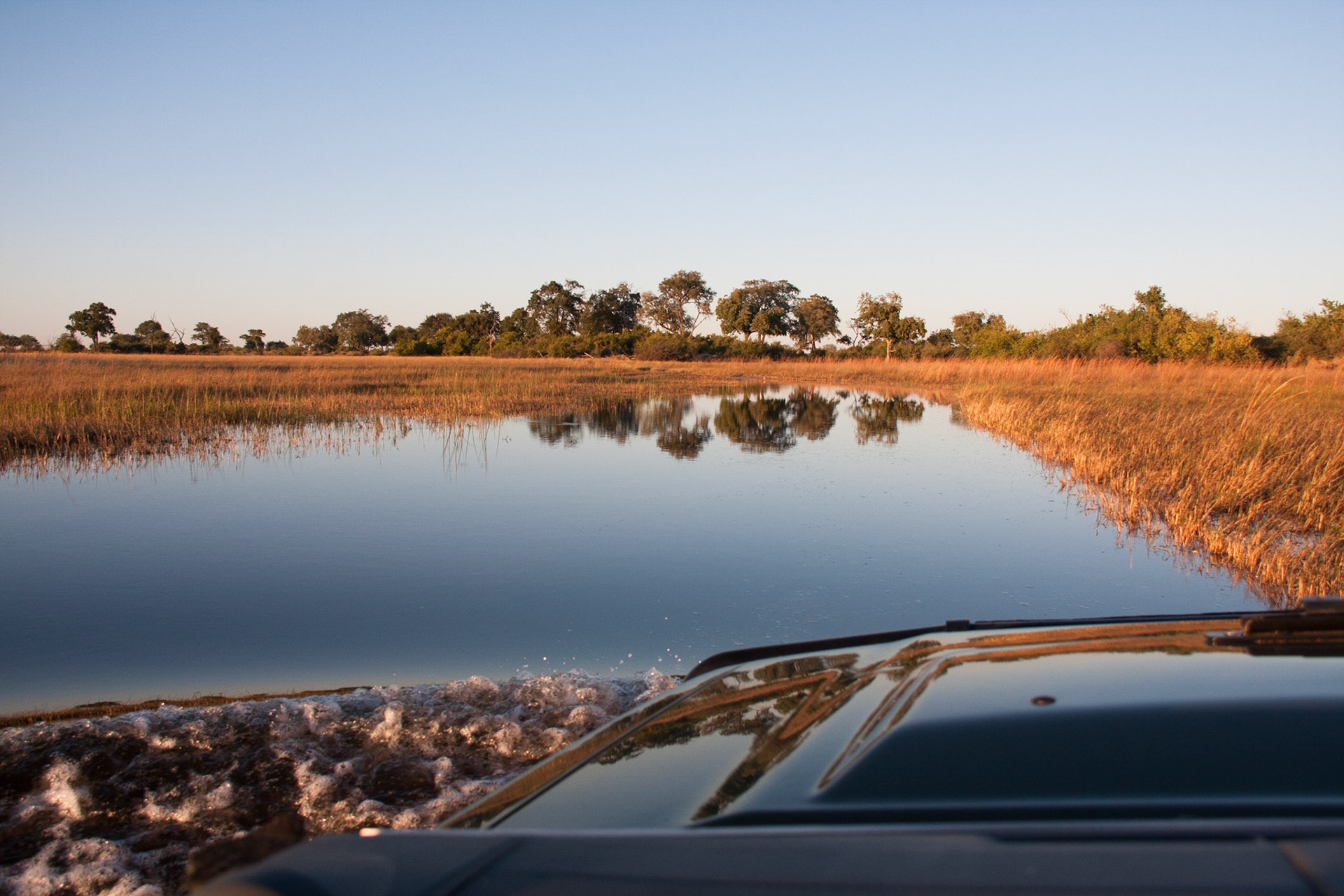 Driving through water, a frequent occurrence in the Okavango Delta