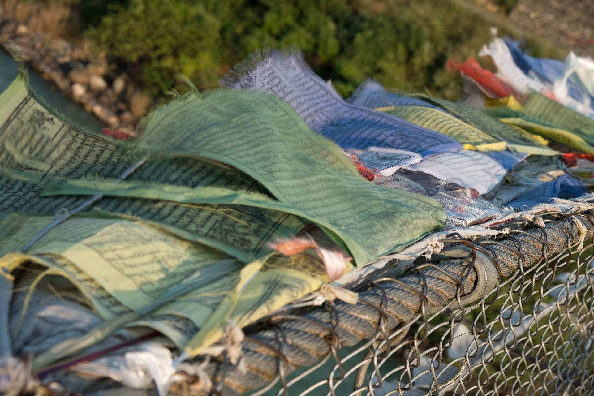 Prayer flags on a bridge