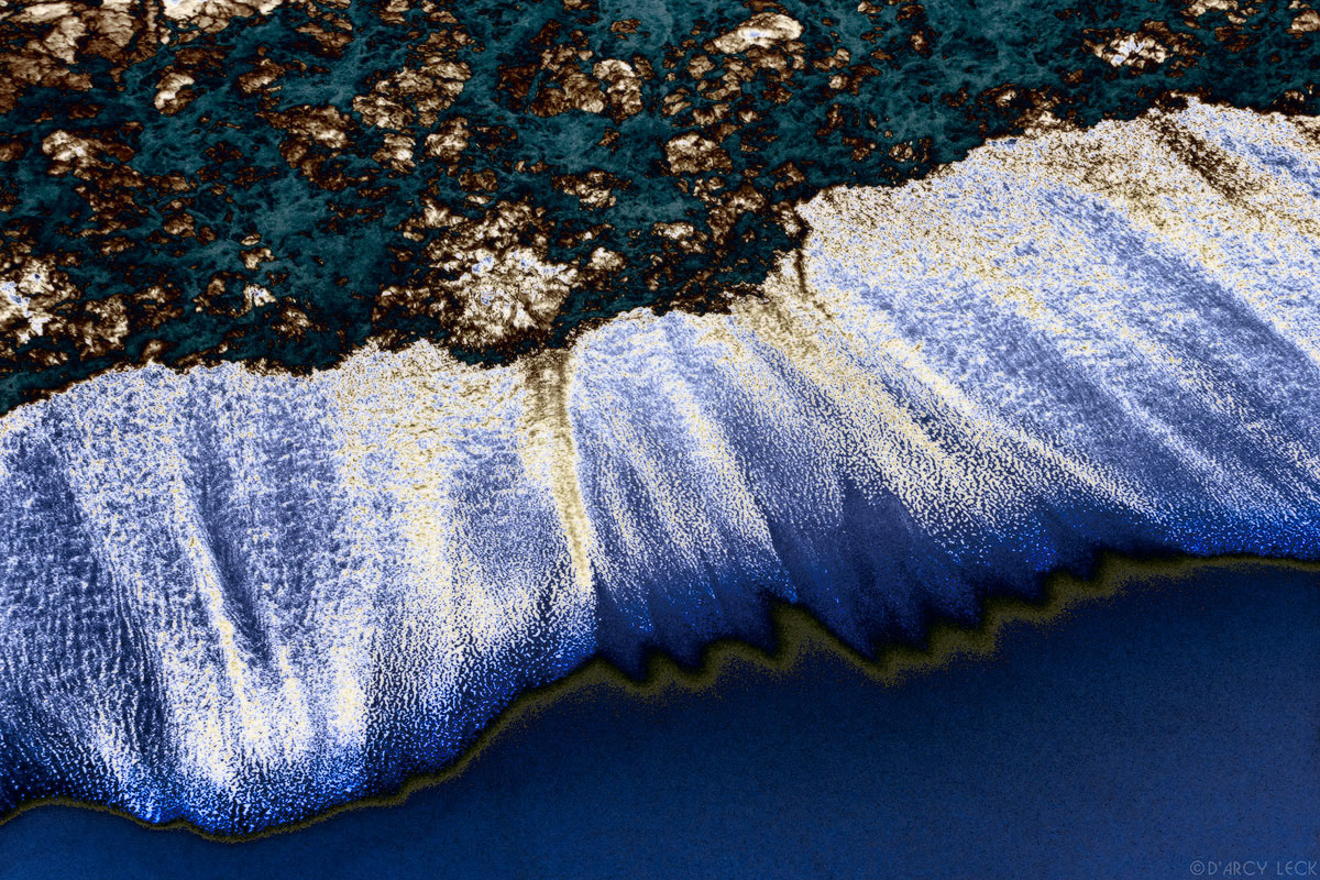 Cosmic storm - abstract nature image of surf on beach