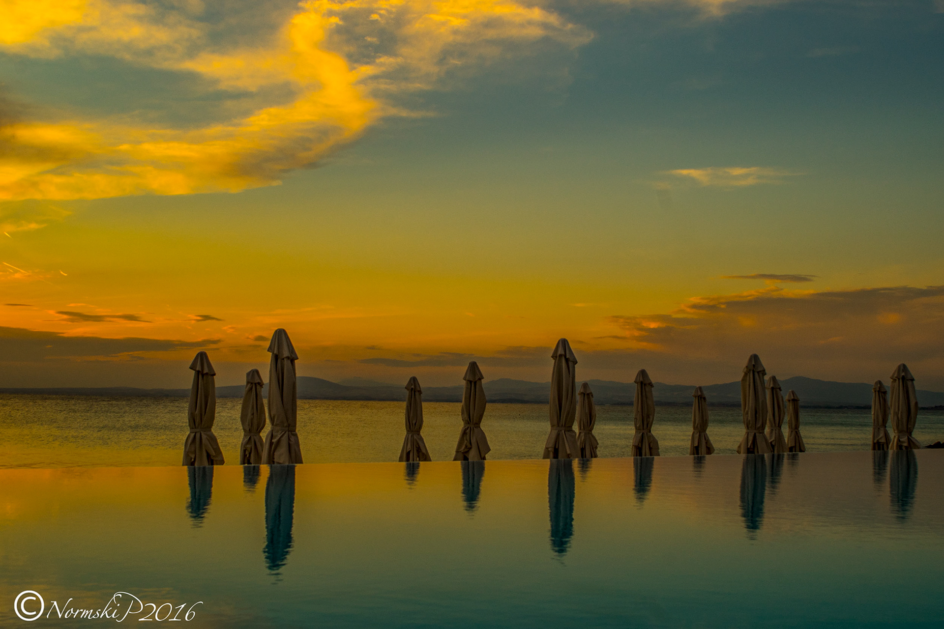 Infinity pool by sunset
