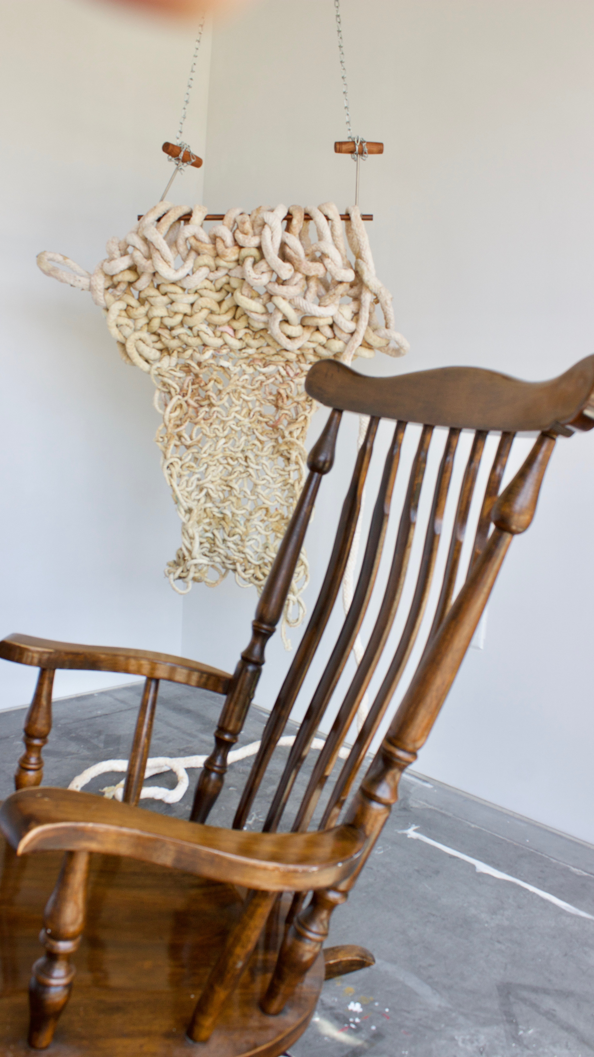 sculptural remnants from an hour and forty minute long performance. Arm knitting latex cord
