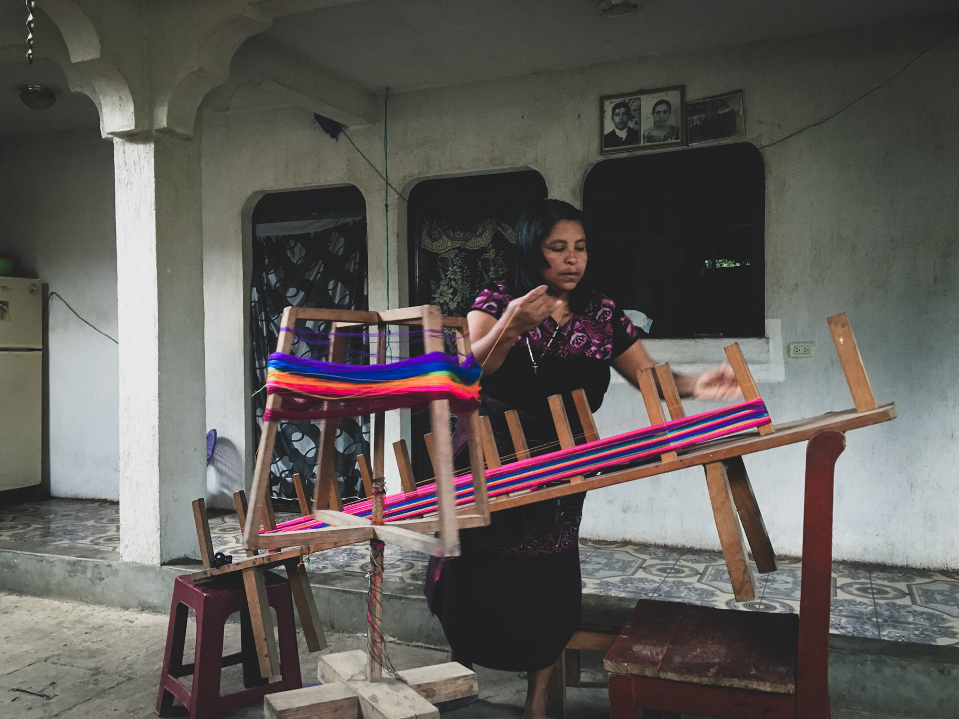 Susana arranging threads for rainbow belt