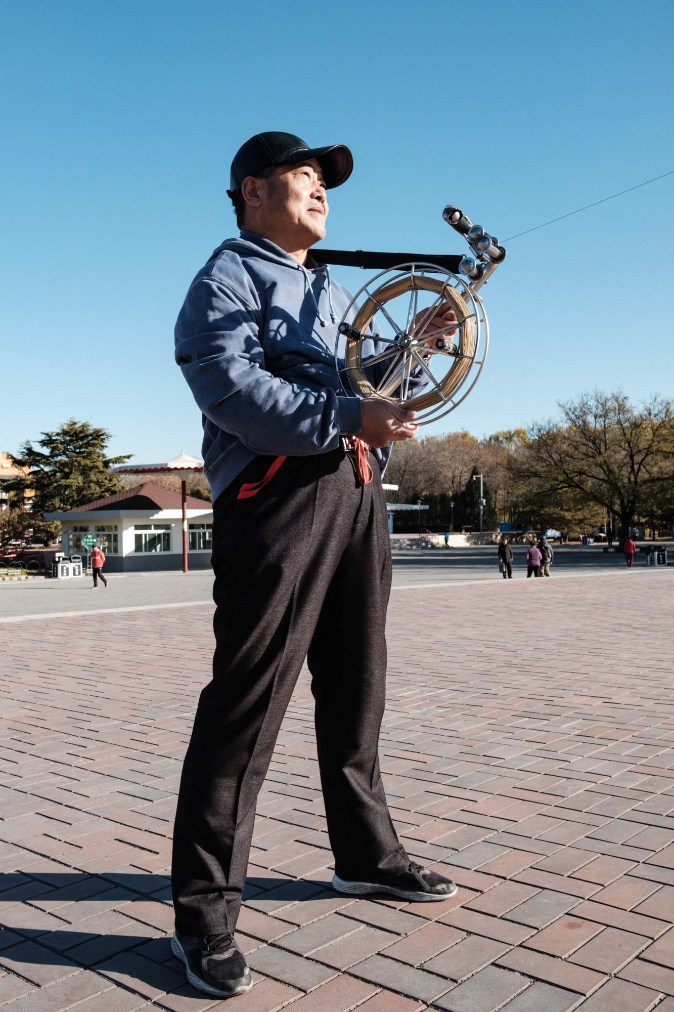 Kite flyer, Chaoyang Park, Beijing