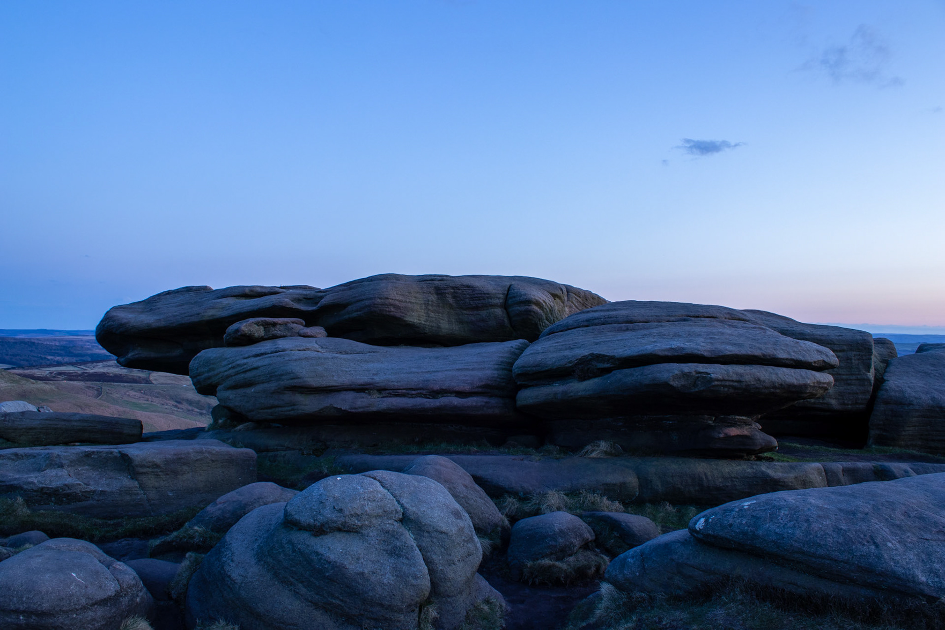 Night time calls over the millstone grit on Stanage Edge