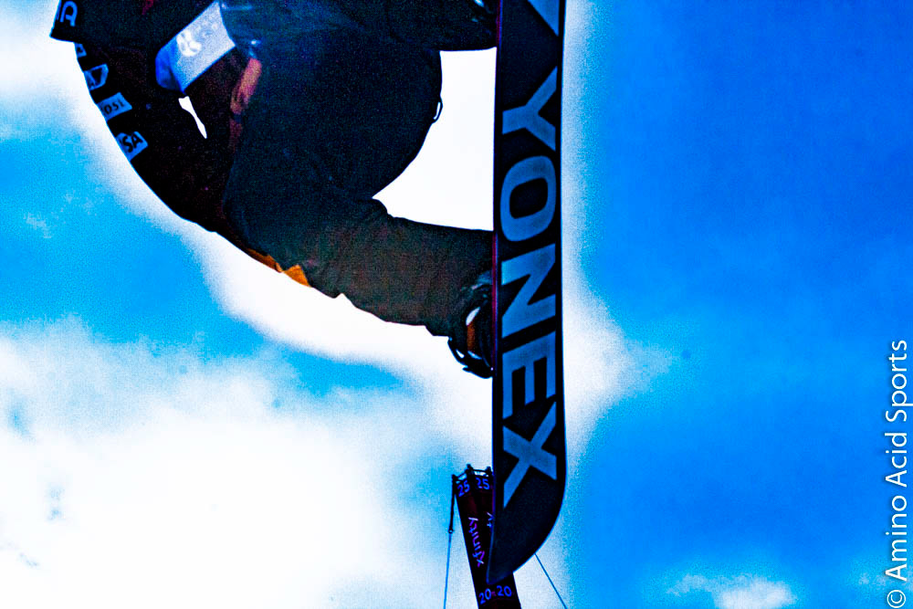 Nippon proud Yuto Totsuka flies outta the halfpipe left wall on his nose grab of his Yonex board