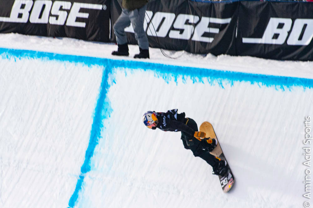 Toby Miller, 19 (USA) , soars his 1st run with a cork front 720* flip.