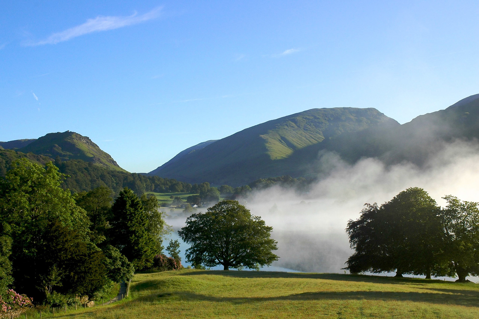 Early morning mist over Grasmere in the English Lake District