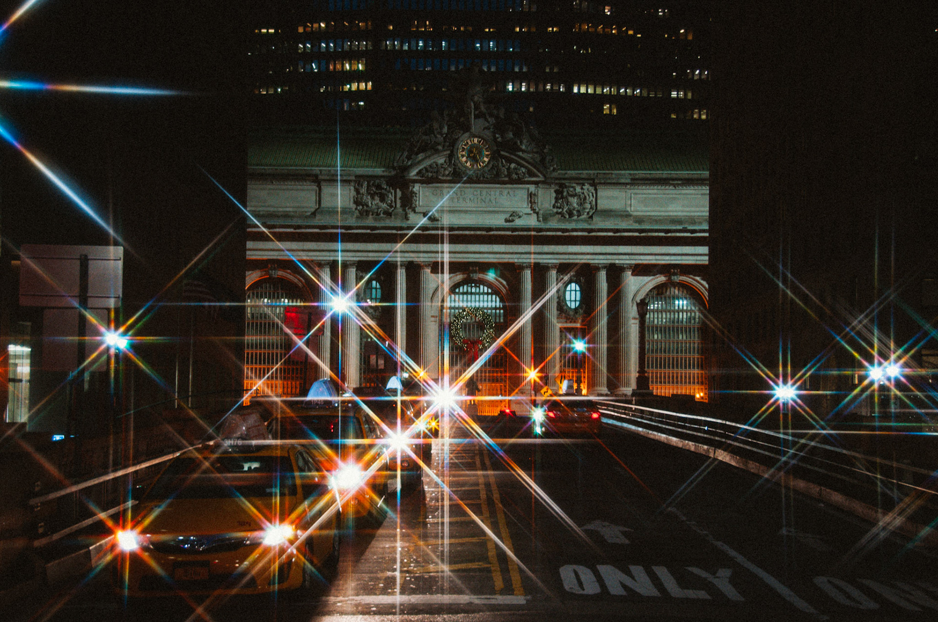 A wreath is hung in front of Grand Central Terminal to celebrate the winter holidays.