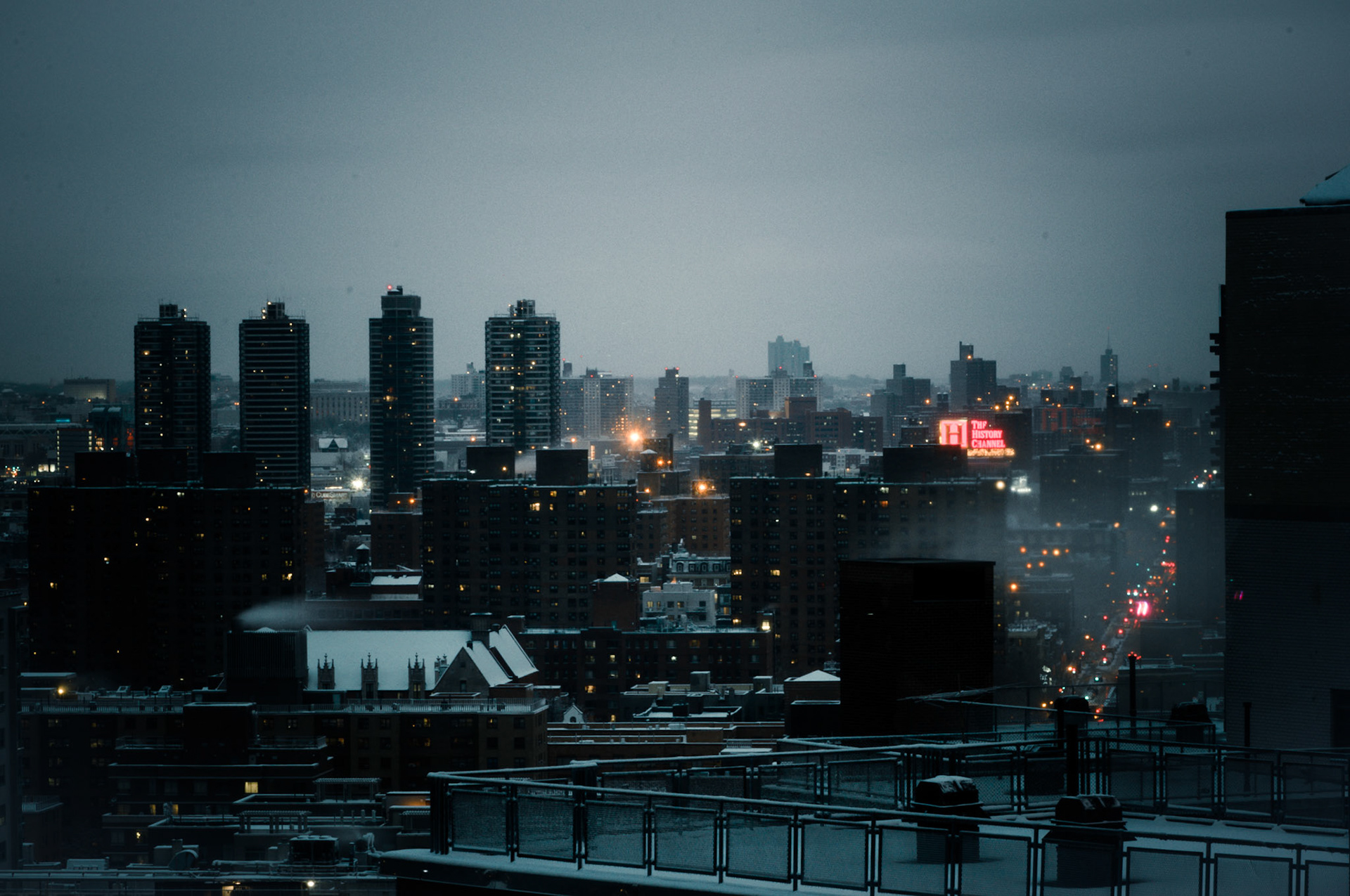 Dark, snowy night on the east side of Manhattan.