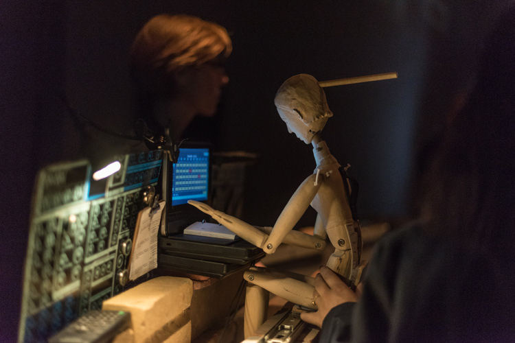 Puppet working on control station