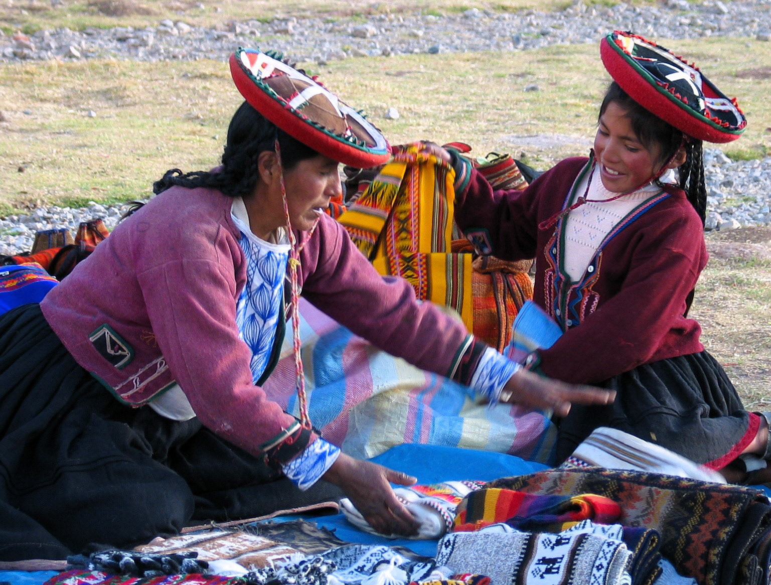 One of the colorful shops at the market in Chinchero. It is not always easy to catch spontaneous moments like this.