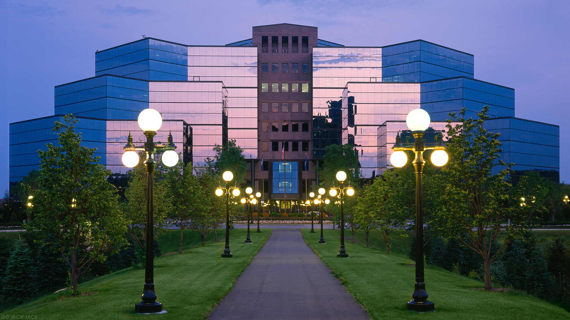 Architectural photographer D'Arcy Leck photographs the exterior of the Minnesota Revenue Building