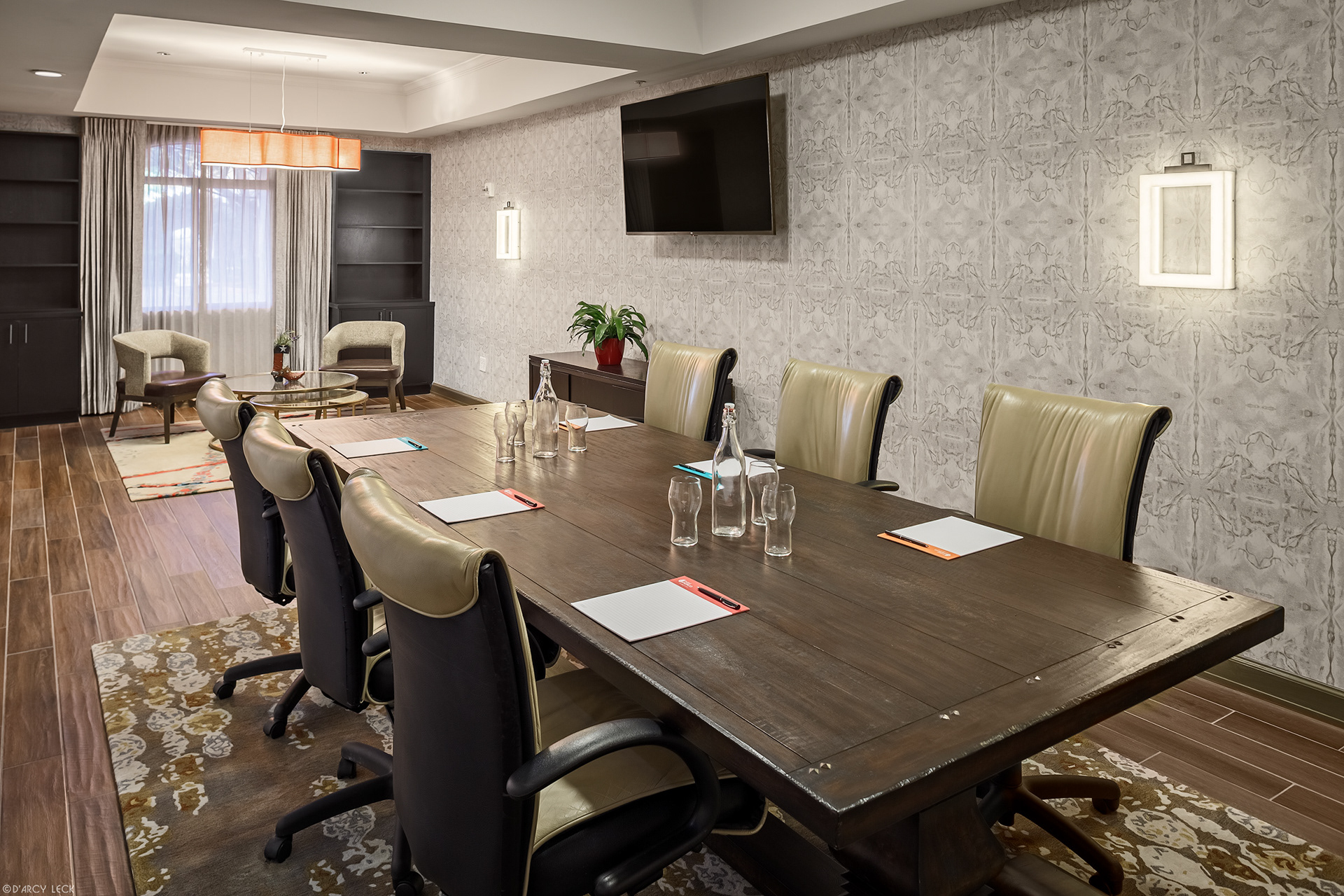 Hospitality photographer D'Arcy Leck photographs a boardroom meeting space of the Hotel Indigo San Antonio Riverwalk