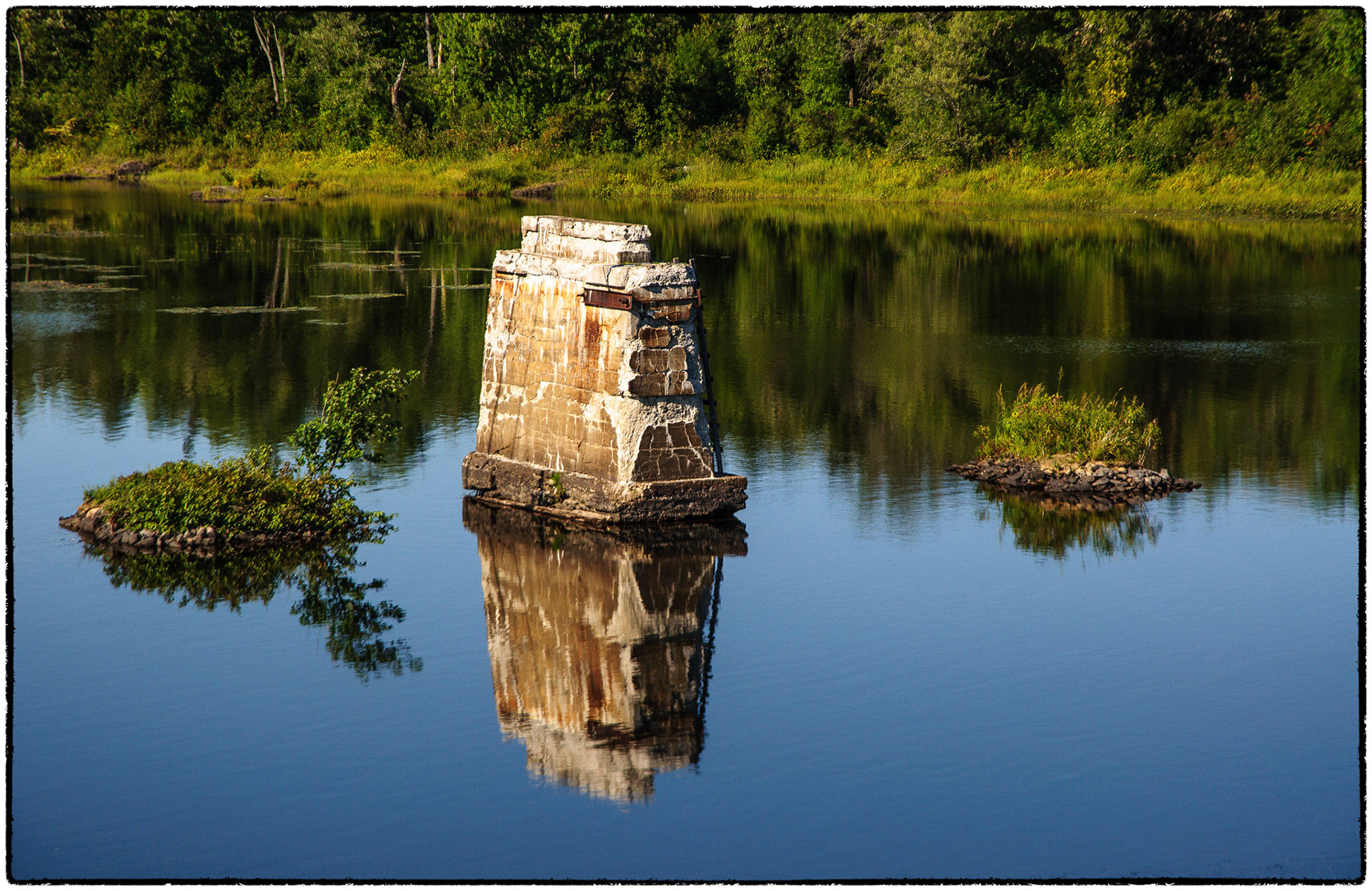 A lone pier from a former railway bridge off Highway 17 West