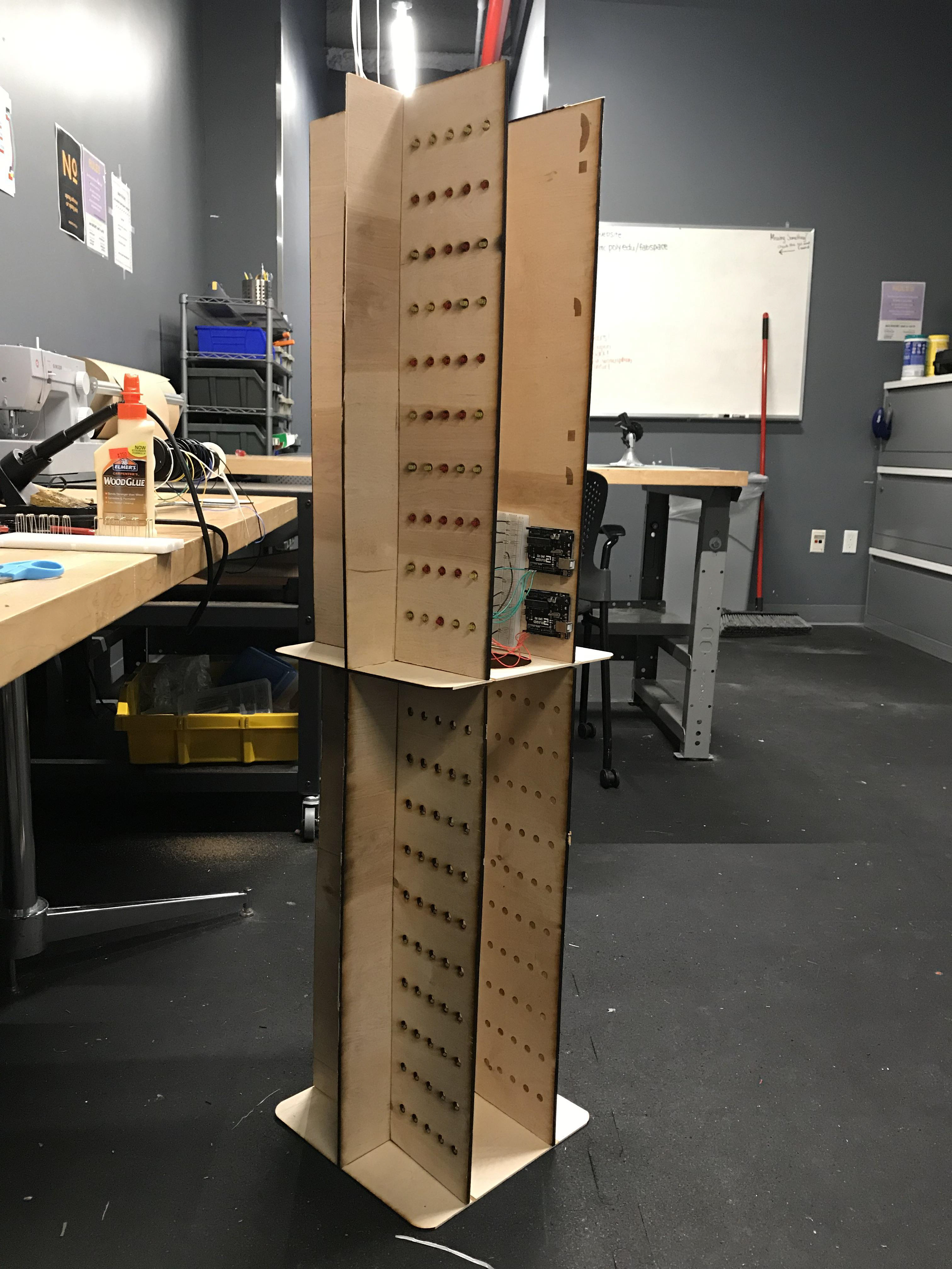 Fig. 18 - Setting up the plywood tower