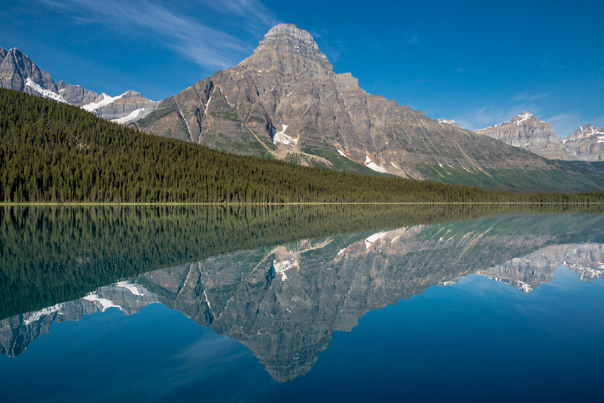 Waterfowl Lake reflecting Mount Chephren on the Icefields Parkway, Banff National Park, Canada.